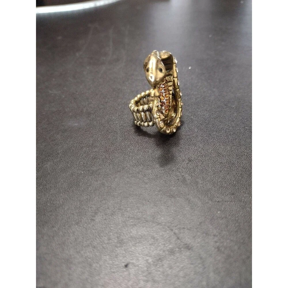 Gold tone rhinestone snake ring